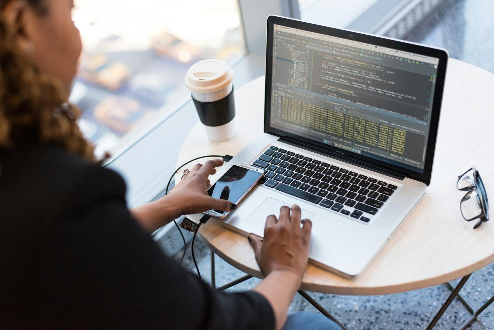 person on computer - Model Versioning