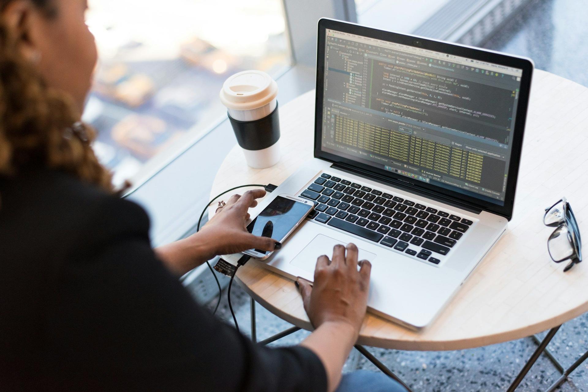 person on computer - Model Versioning
