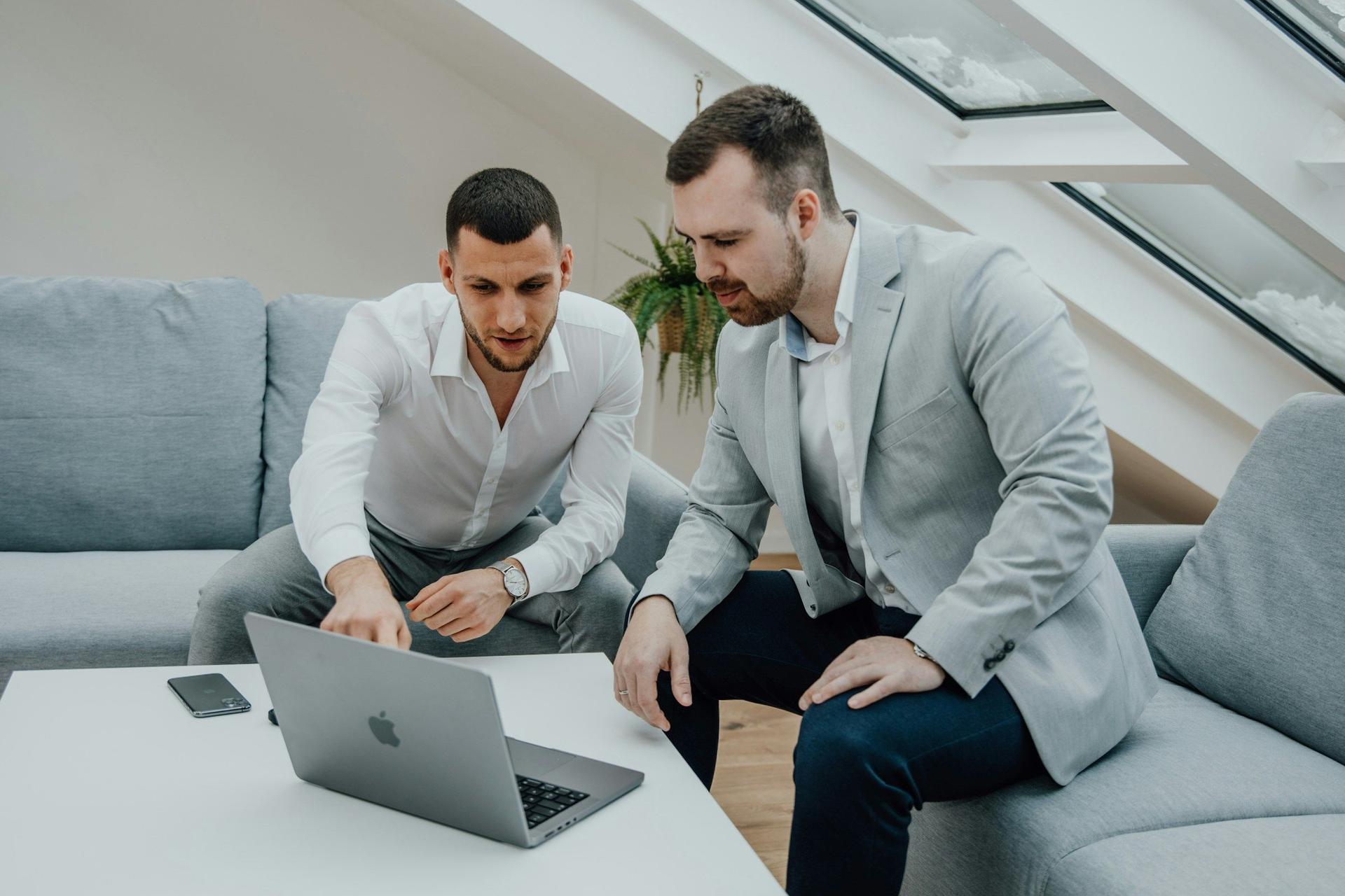 man with laptop - Pros and Cons of Serverless Architecture
